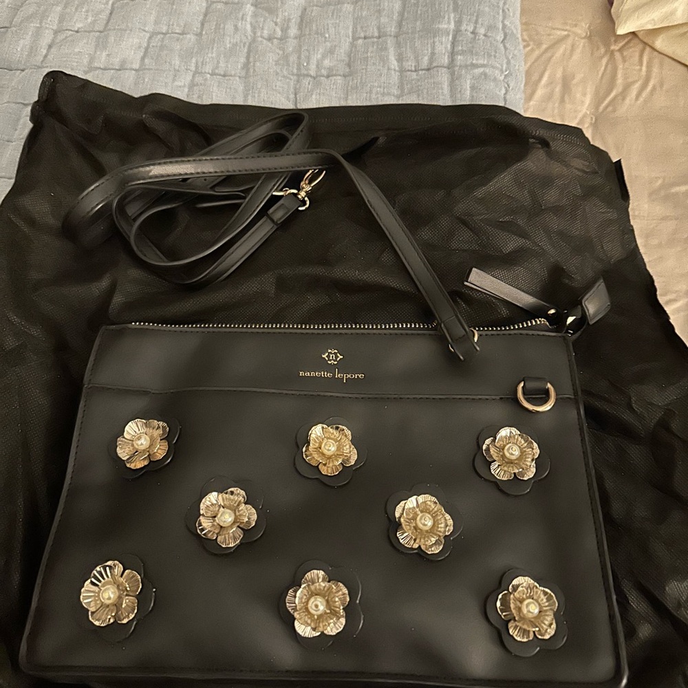 Cute Nanette Lepore shoulder/clutch with silver and gold embellishment